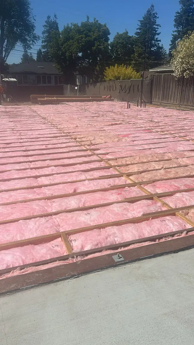 Full raised foundation deck insulated with batts on a Bay Area new construction job