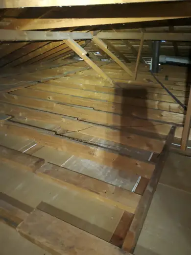 Attic floor cleaned down to the drywall