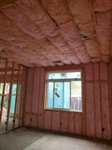 Bedroom remodel with batts in walls and ceiling