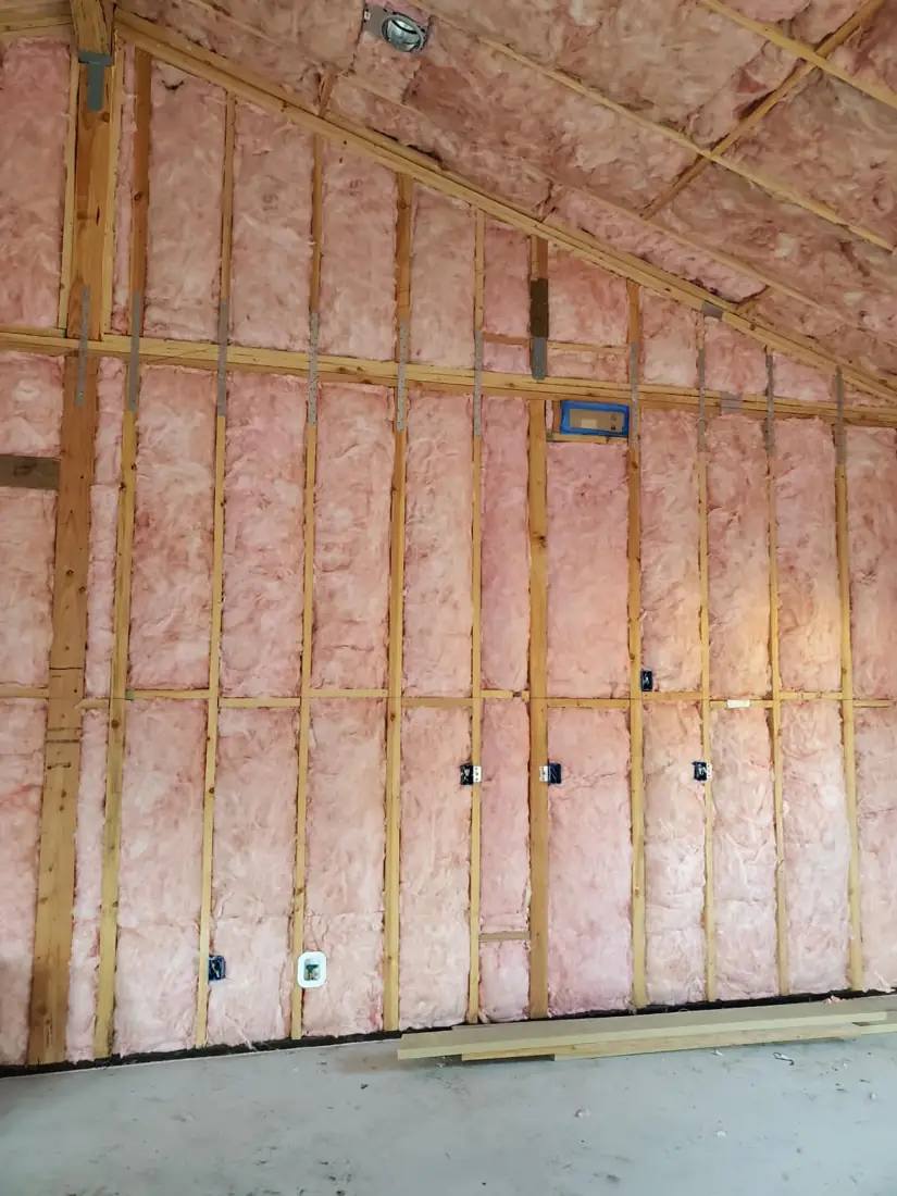 Batts installed in walls and a vaulted ceiling